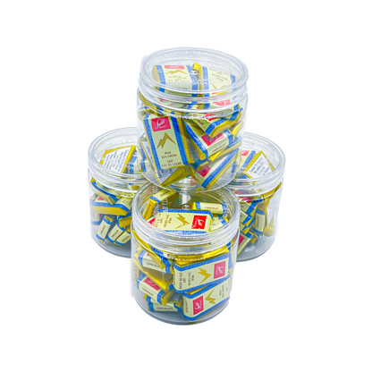 Swiss Delice Mini Chocolates and Rich sweetness of chocolates conveniently packaged in reusable plastic jars